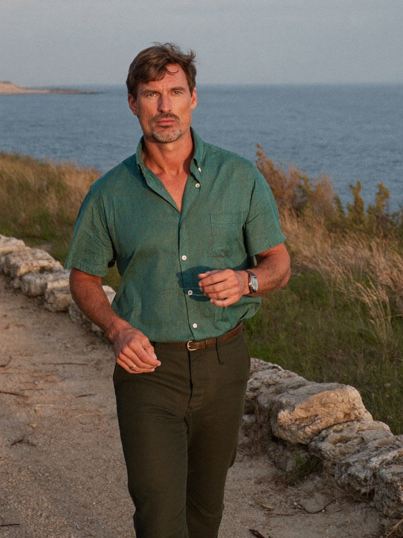 A mature man taking his morning walk along a coastal path